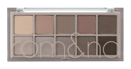 Paleta de sombras rom&nd con tonos románticos y efecto glow para maquillaje natural y sofisticado.